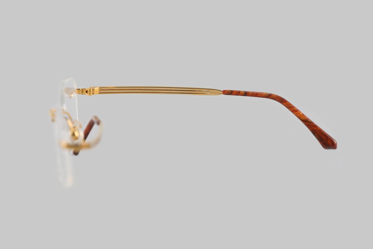 18k gold rimless frame